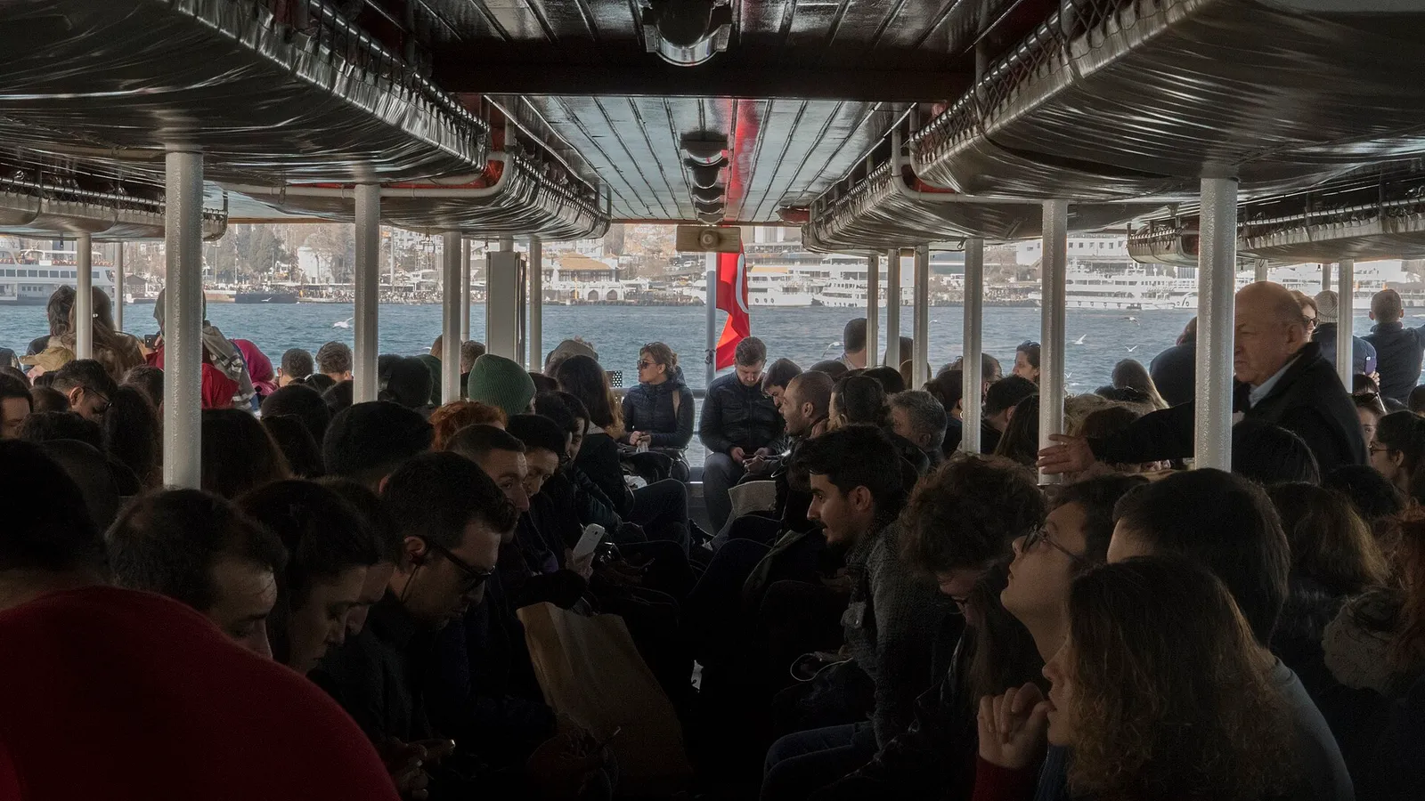 A passenger ferry crossing the Bosphorus strait in Istanbul